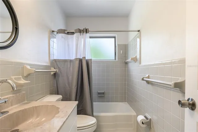 a view of a door and chair in a room