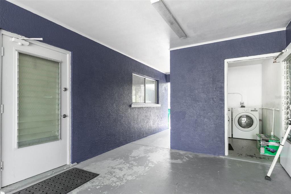 1214 Ansin Street Punta Gorda, FL 33950 - Photo 23 of 24 a view of a door and chair in a room