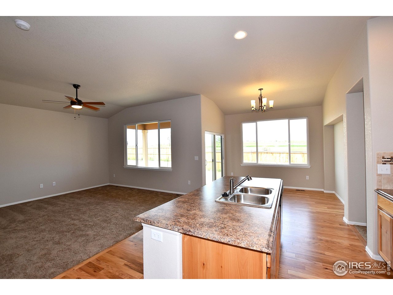 623 86th Avenue Greeley, CO 80634 - Photo 17 of 38 a view interior of a house with wooden floor