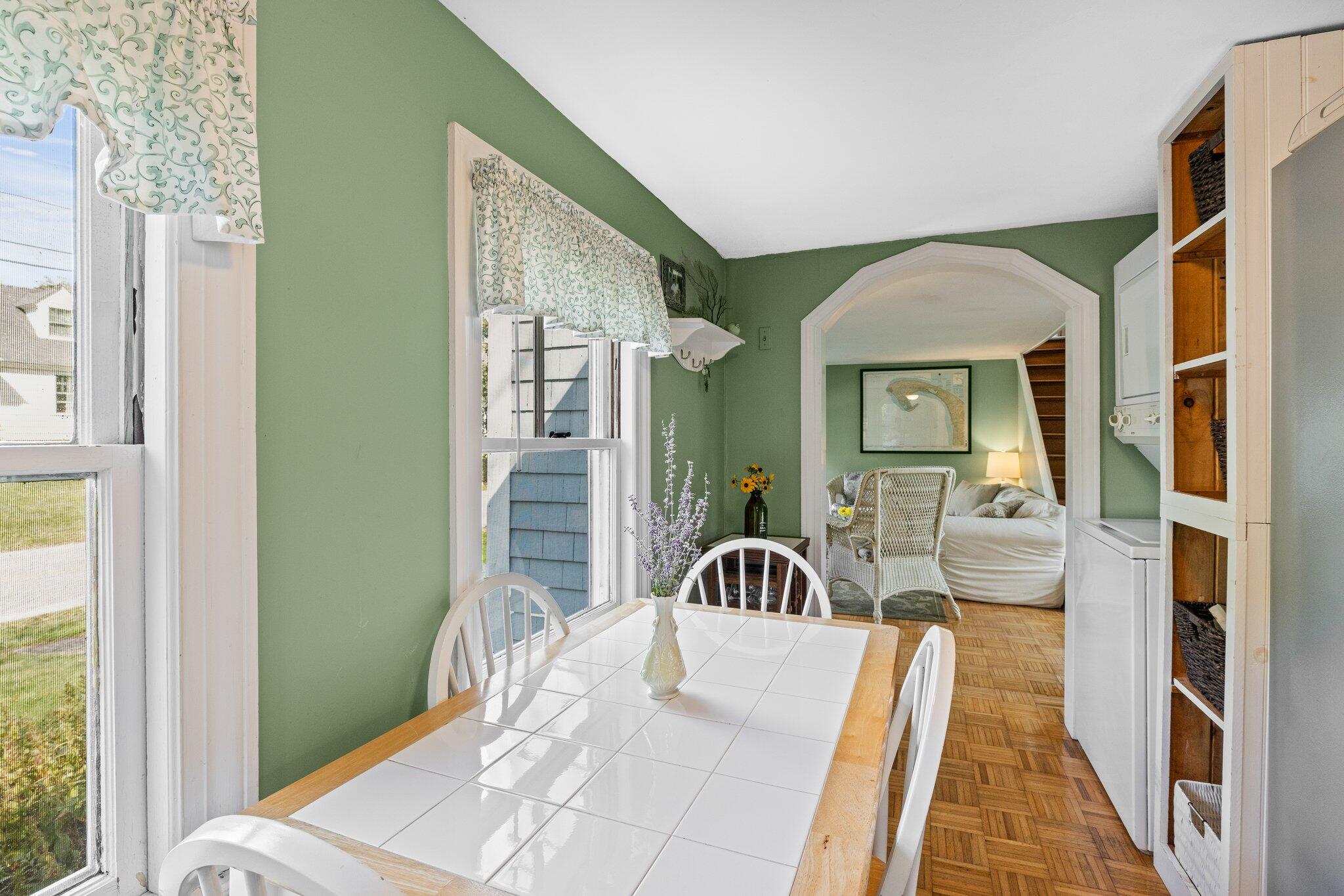 14 Pond Road Truro, MA 02666 - Photo 8 of 49 a living room with furniture and a large window
