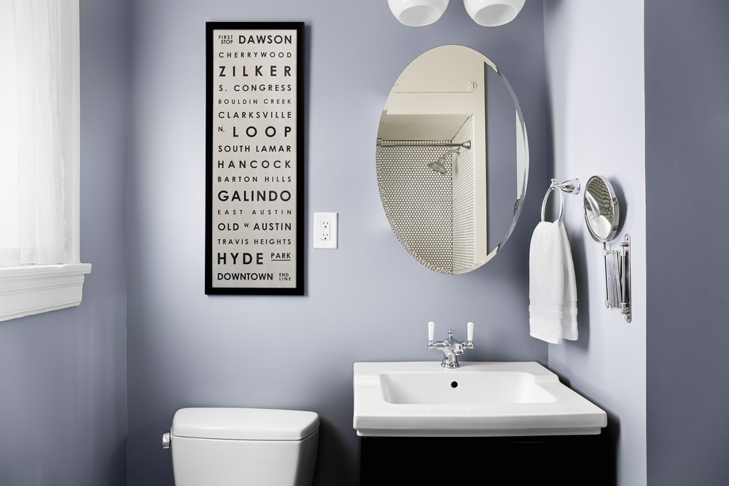 3812 Duval Street Austin, TX 78751 - Photo 20 of 22 a bathroom with a toilet sink and mirror