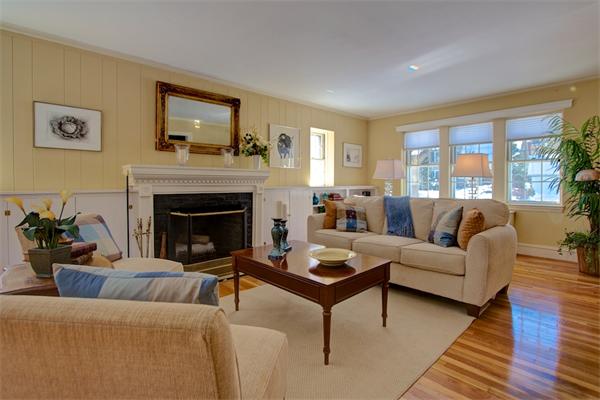 12 Stowell Road Winchester, MA 01890 - Photo 7 of 28 a living room with furniture and a fireplace
