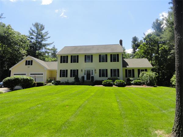 98 Bushy Lane Rutland, MA 01543 - Photo 1 of 30 a view of a house with a yard and sitting area