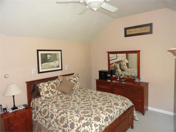 98 Bushy Lane Rutland, MA 01543 - Photo 16 of 30 a bedroom with a bed and a dresser