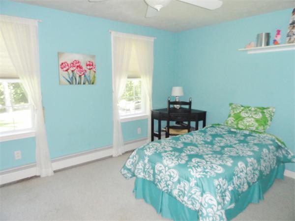 98 Bushy Lane Rutland, MA 01543 - Photo 18 of 30 a bed sitting in a bedroom next to a window