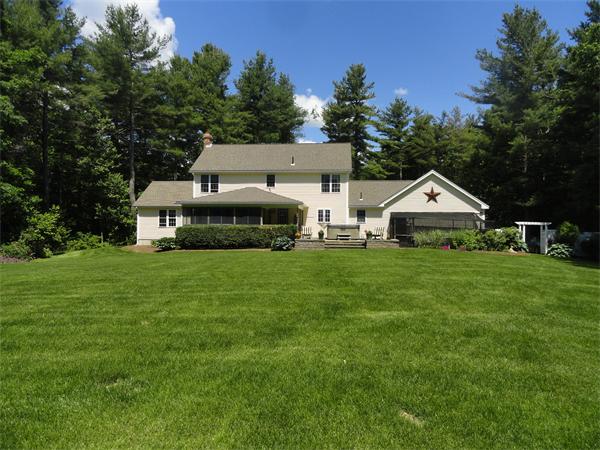 98 Bushy Lane Rutland, MA 01543 - Photo 28 of 30 a house view with a garden space