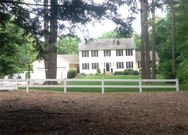 98 Bushy Lane Rutland, MA 01543 - Photo 30 of 30 a view of house with a big yard and large trees