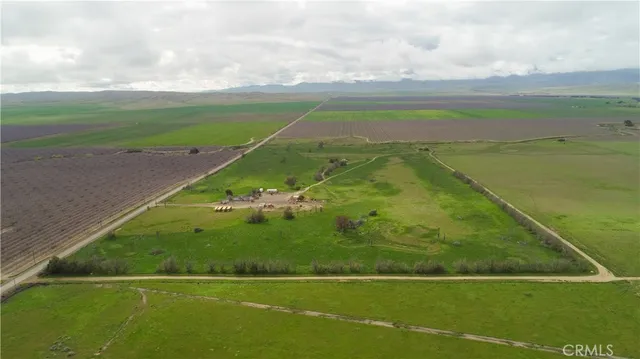 a view of an outdoor space and tennis court