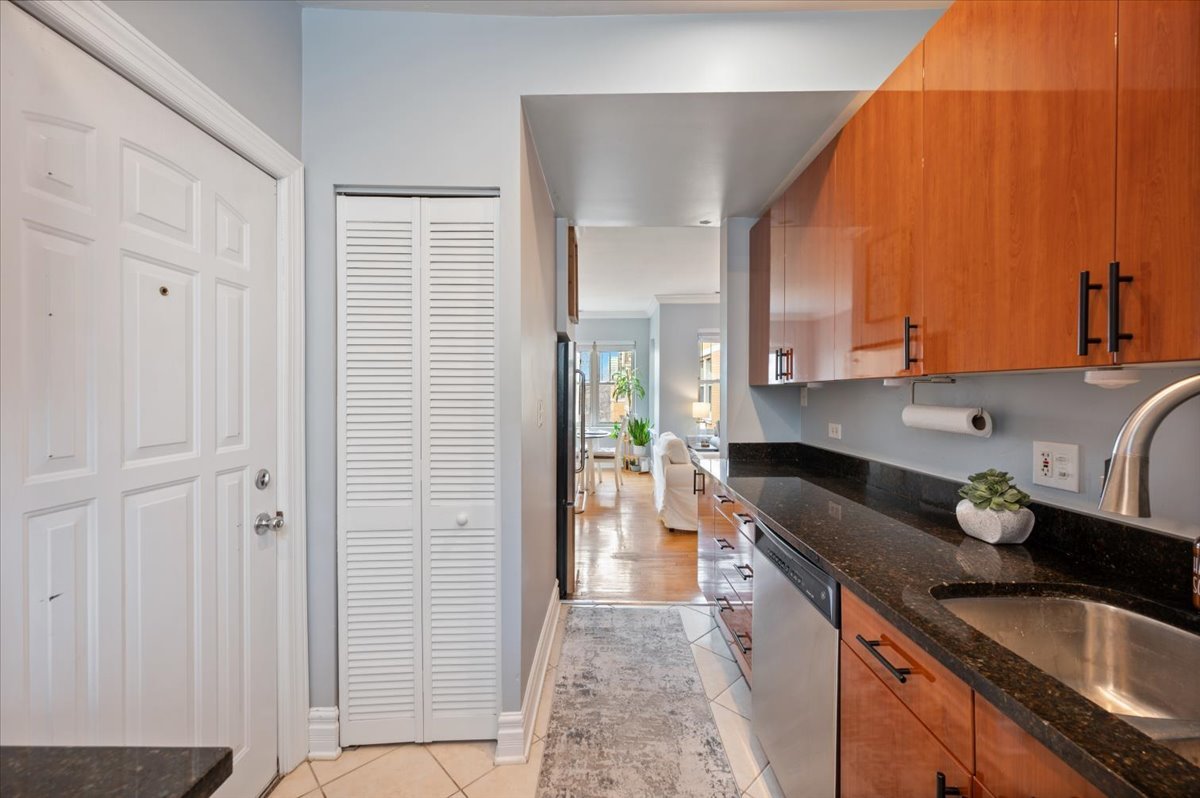 3135 West Palmer Square, Unit 3 Chicago, IL 60647 - Photo 10 of 30 a kitchen with a sink and a refrigerator