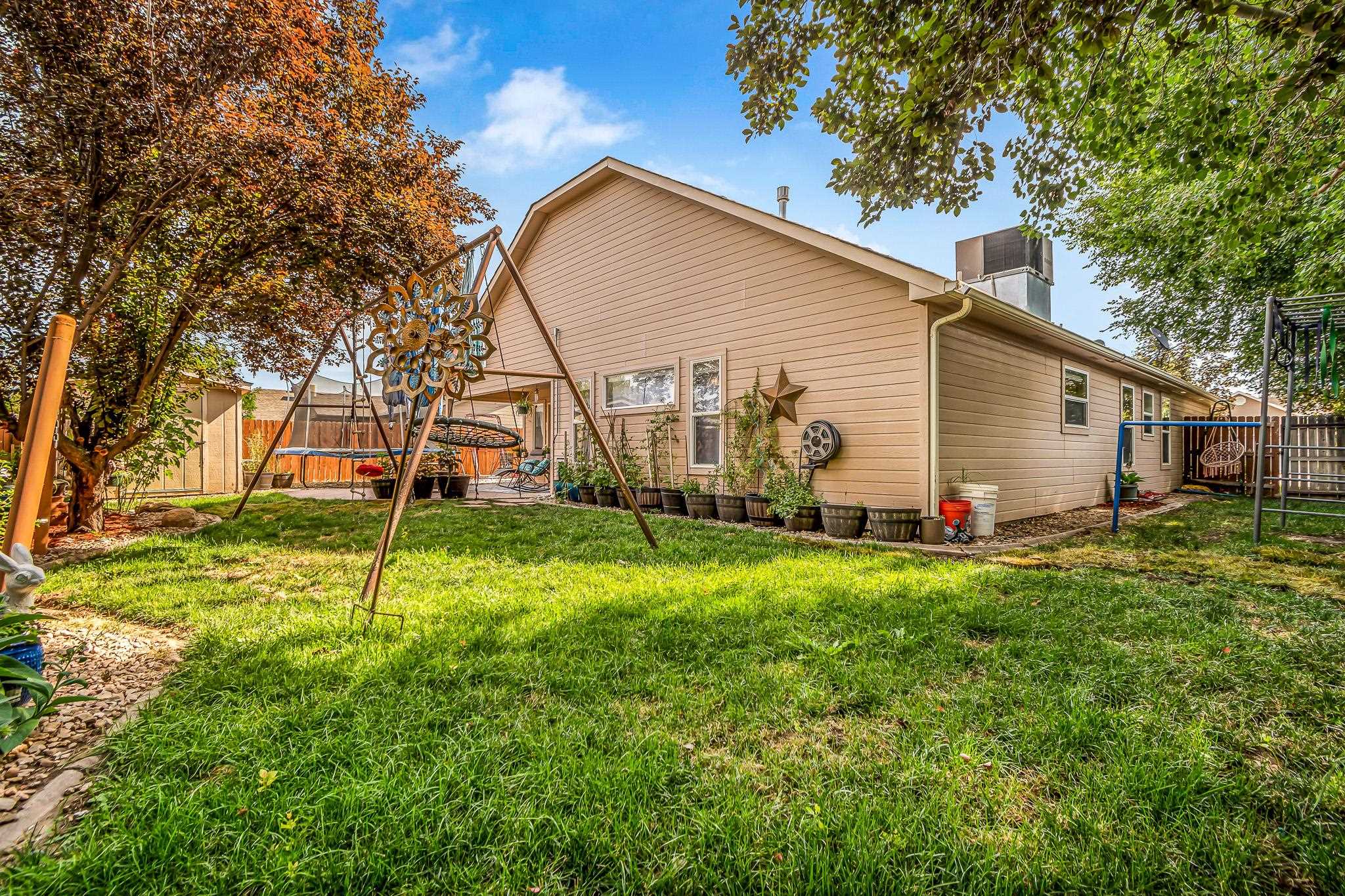 697 Jasper Drive Fruita, CO 81521 - Photo 23 of 26 a view of a backyard of the house