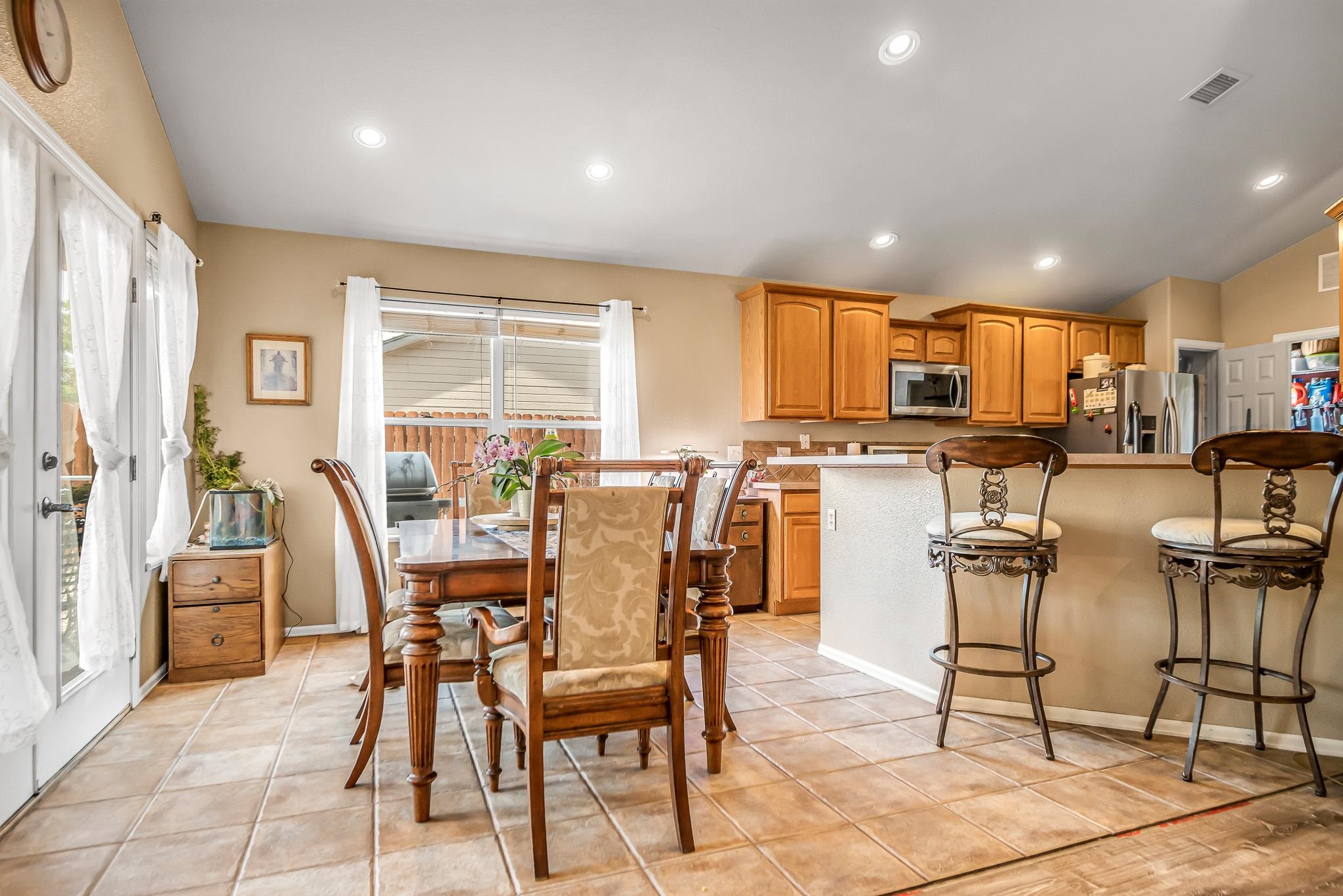 697 Jasper Drive Fruita, CO 81521 - Photo 9 of 26 a view of a dining room with furniture