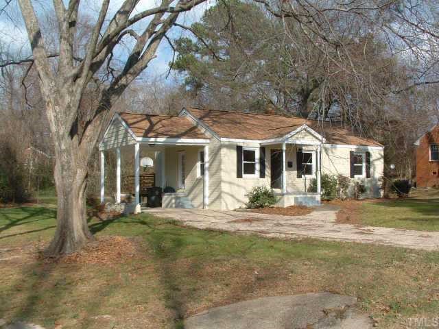 2319 Stevens Road Raleigh, NC 27610 - Photo 1 of 7 a front view of a house with yard outdoor seating and barbeque oven