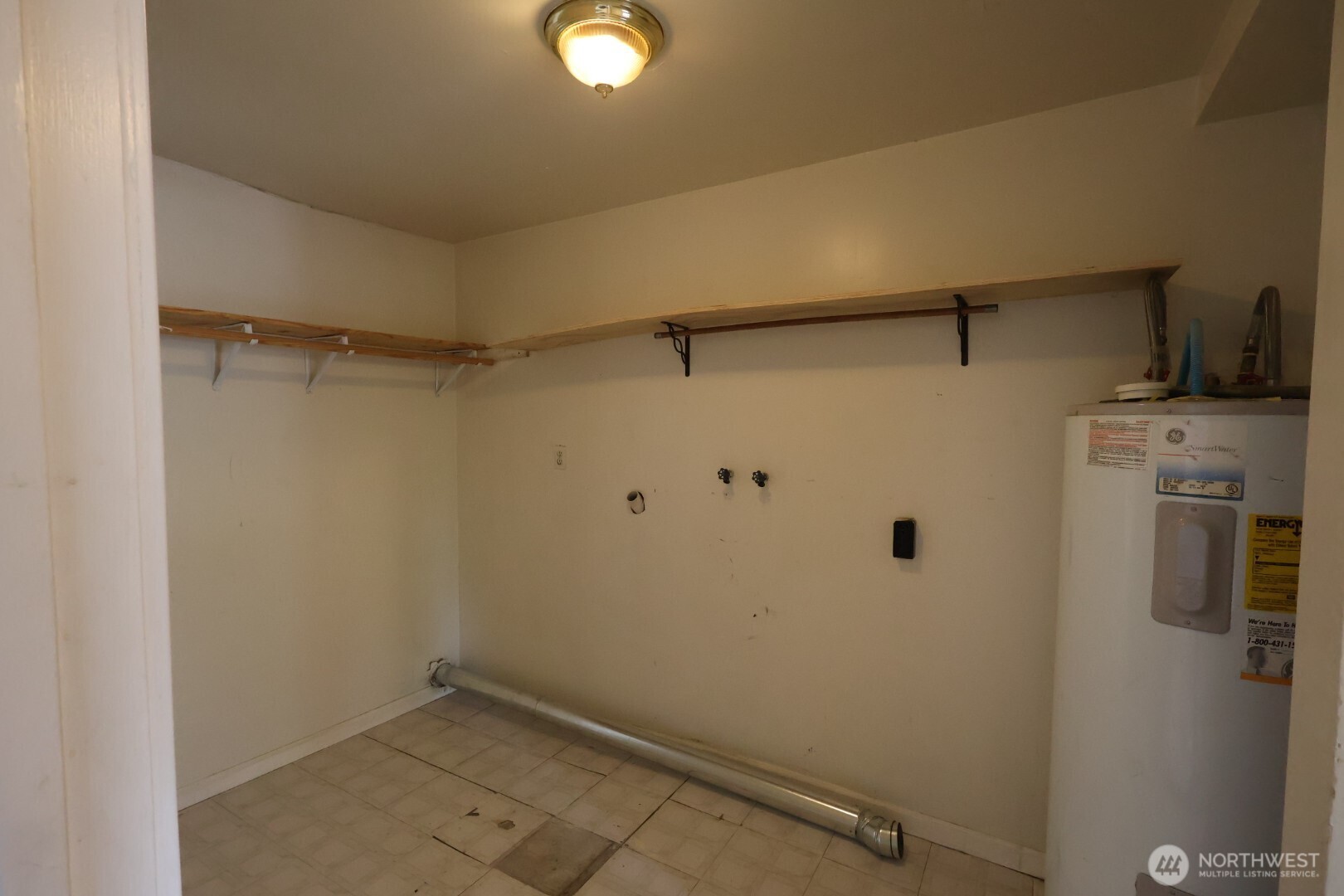 2604 South 122nd Street Seattle, WA 98168 - Photo 11 of 17 a view of a storage & utility room with closet