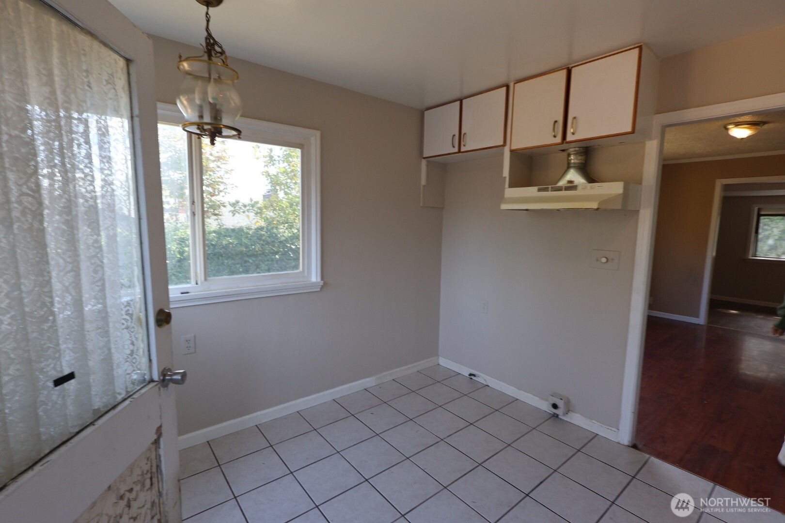 2604 South 122nd Street Seattle, WA 98168 - Photo 14 of 17 a view of an empty room with a window