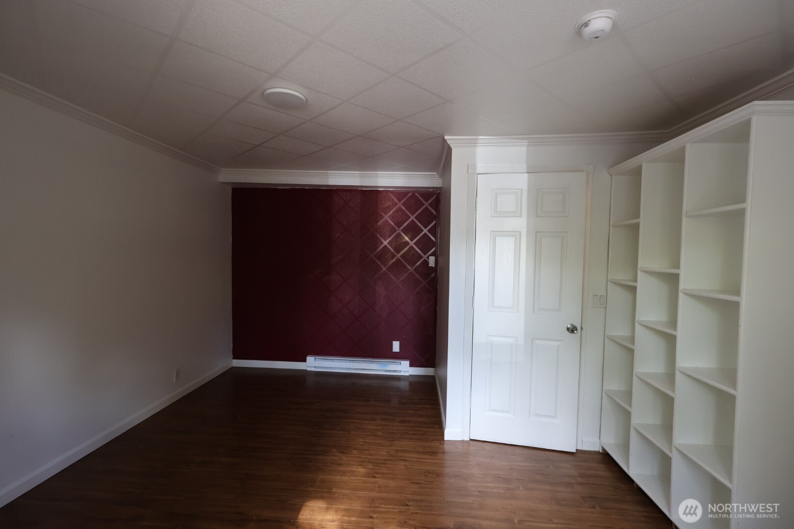 2604 South 122nd Street Seattle, WA 98168 - Photo 10 of 17 a view of room with wooden floor