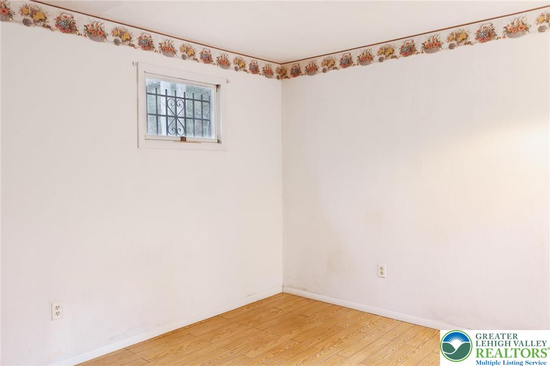 5211 Fir Lane Pocono Summit, PA 18346 - Photo 18 of 38 a view of a room with window and closet