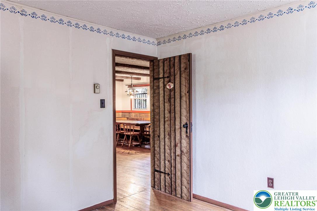 5211 Fir Lane Pocono Summit, PA 18346 - Photo 21 of 38 a view of livingroom with hardwood