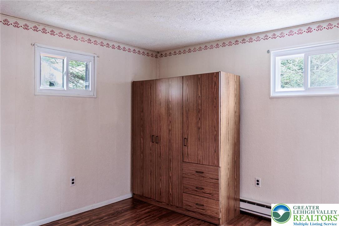 5211 Fir Lane Pocono Summit, PA 18346 - Photo 23 of 38 a view of an entryway with wooden floor