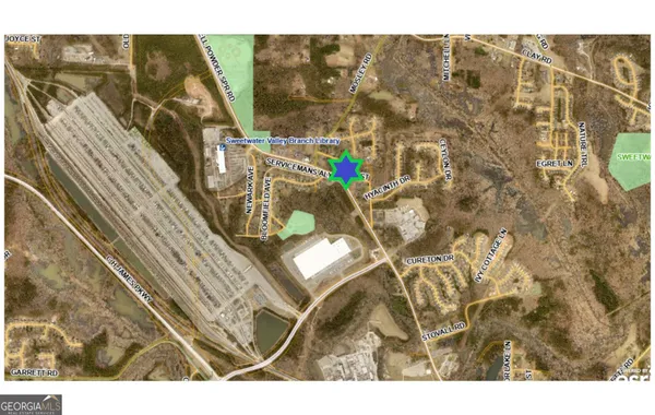 a view of a house with swimming pool