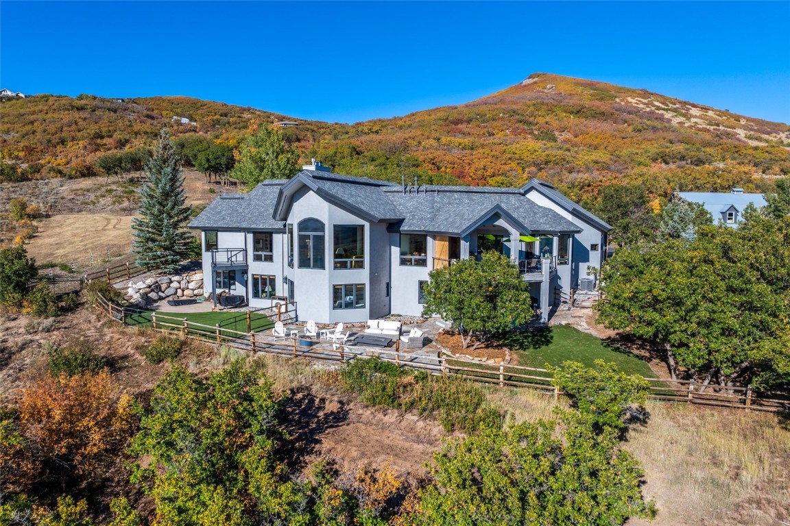 44300 Diamondback Way Steamboat Springs, CO 80487 - Photo 3 of 49 a front view of a house with a yard