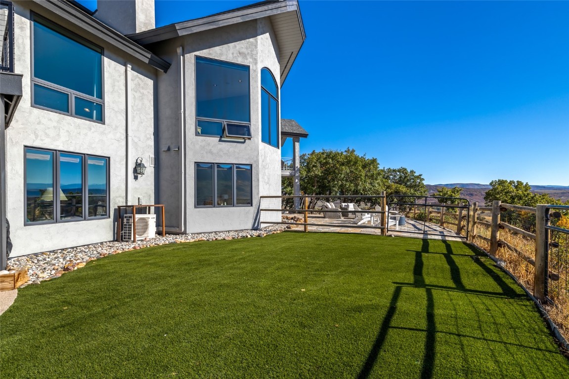 44300 Diamondback Way Steamboat Springs, CO 80487 - Photo 38 of 49 a view of a house with a backyard