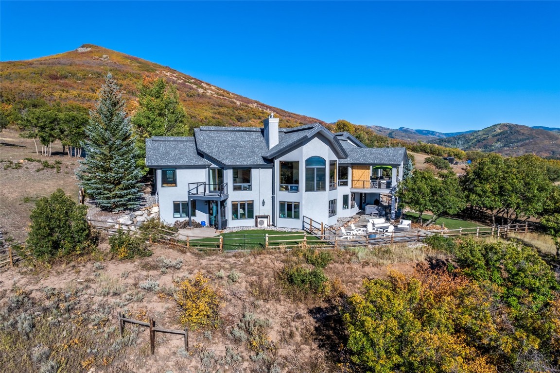 44300 Diamondback Way Steamboat Springs, CO 80487 - Photo 39 of 49 a front view of a house with garden