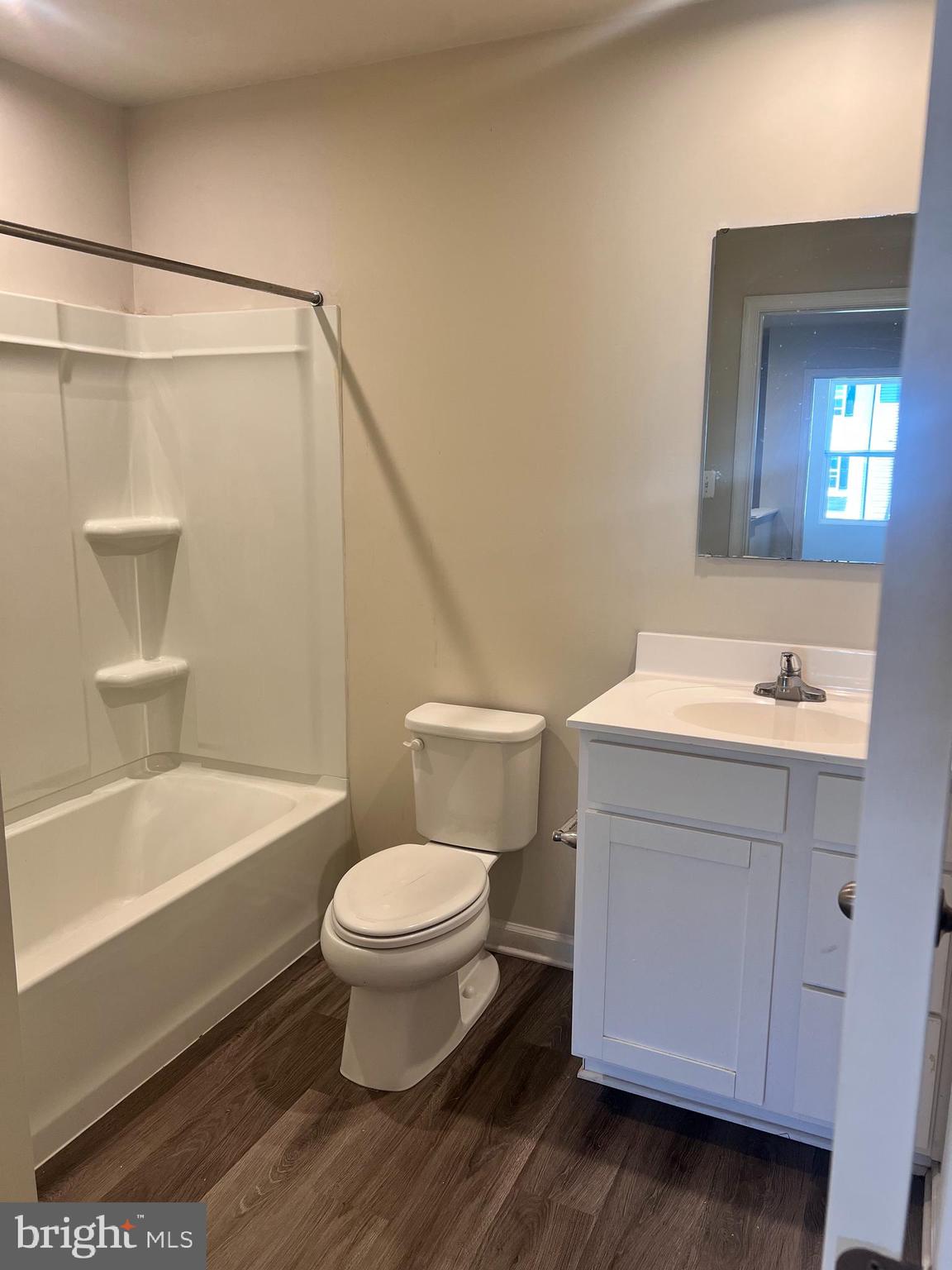122 Butterfield Avenue Taneytown, MD 21787 - Photo 16 of 19 a bathroom with a sink a toilet and a bathtub