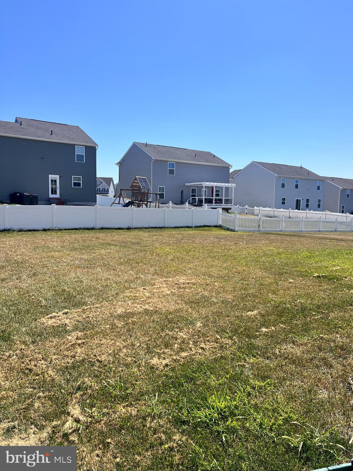 122 Butterfield Avenue Taneytown, MD 21787 - Photo 18 of 19 a view of a large pool with lawn chairs