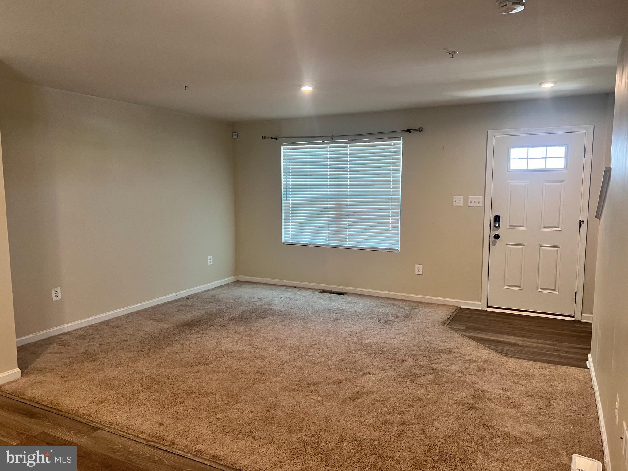 122 Butterfield Avenue Taneytown, MD 21787 - Photo 2 of 19 an empty room with windows