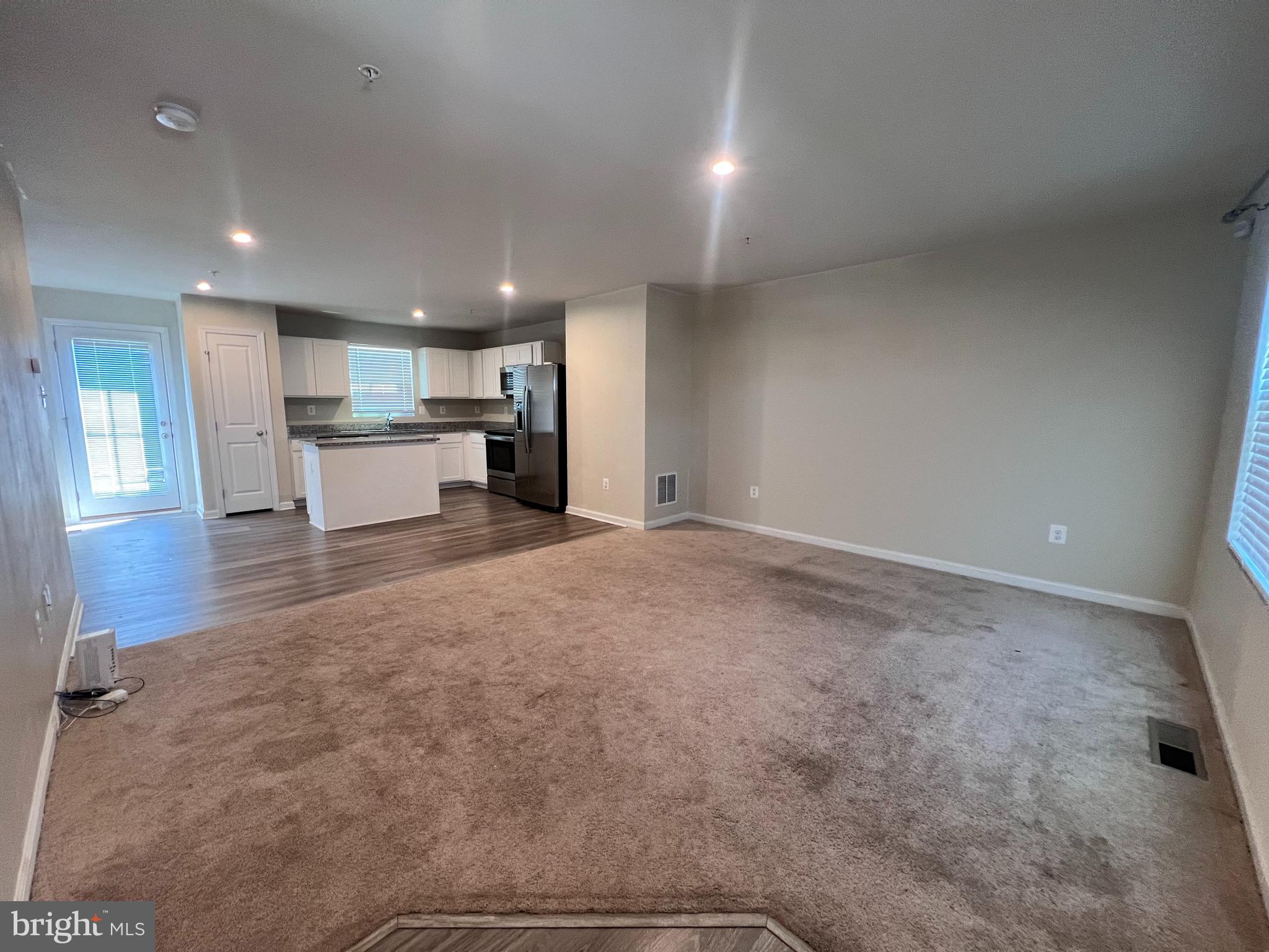 122 Butterfield Avenue Taneytown, MD 21787 - Photo 4 of 19 a view of kitchen and kitchen with window