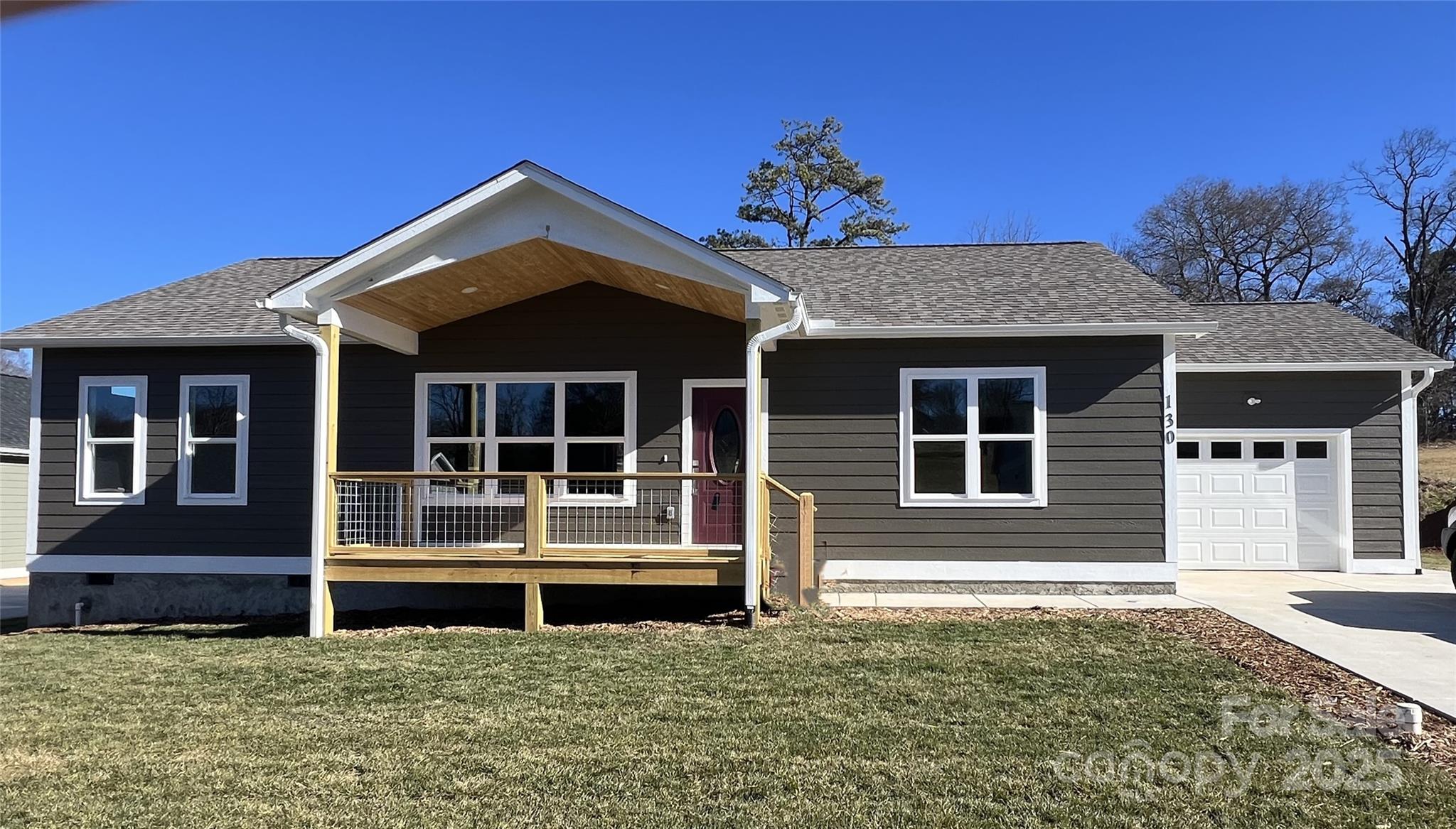 130 Peyton Elaine Road Clyde, NC 28721 - Photo 1 of 12 a front view of a house with a porch