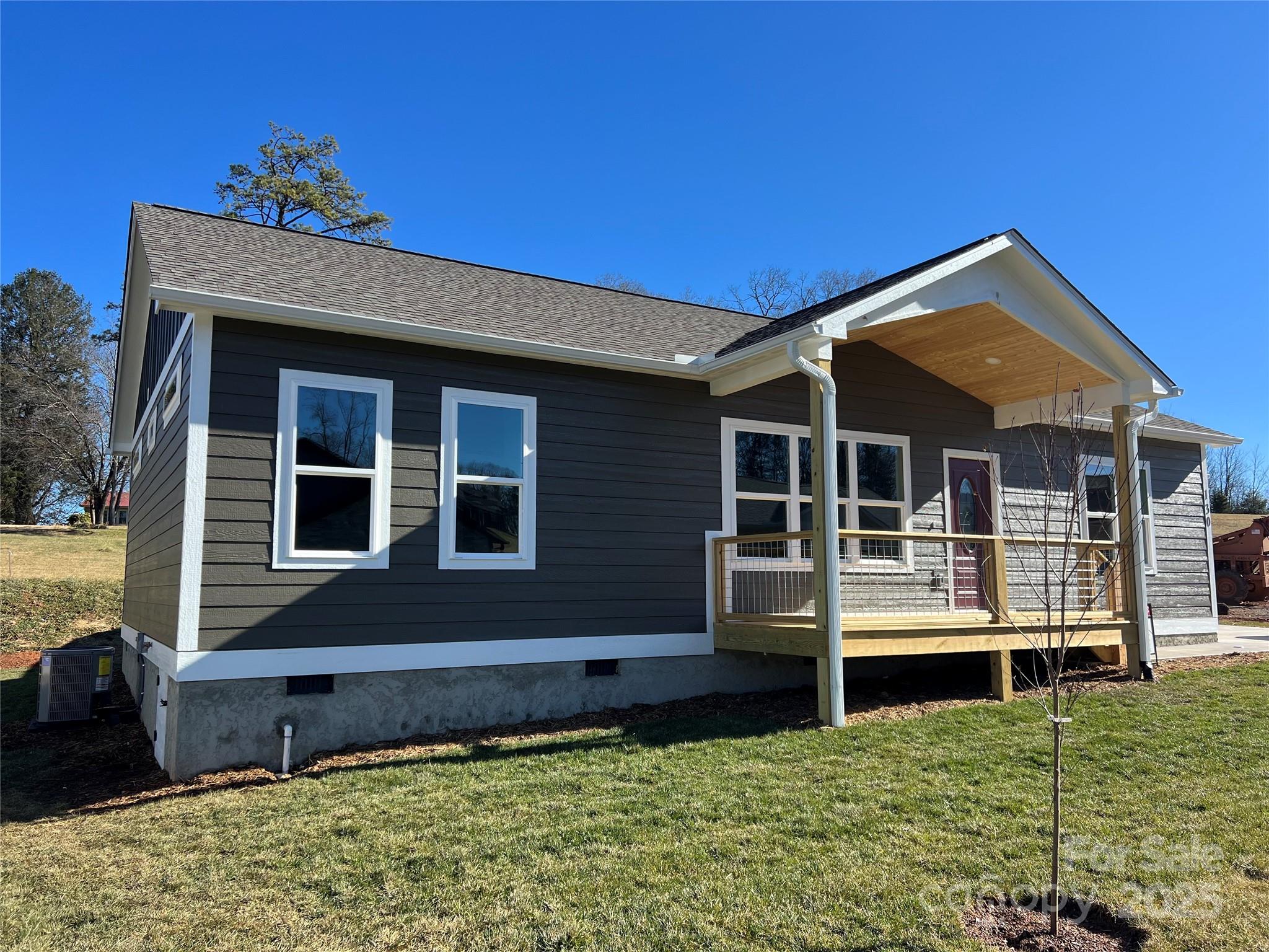 130 Peyton Elaine Road Clyde, NC 28721 - Photo 2 of 12 a front view of a house with garden