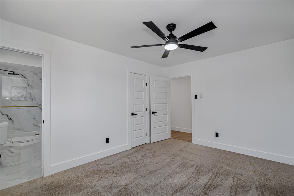 7992 Fallmeadow Lane Dallas, TX 75248 - Photo 23 of 30 a view of an empty room