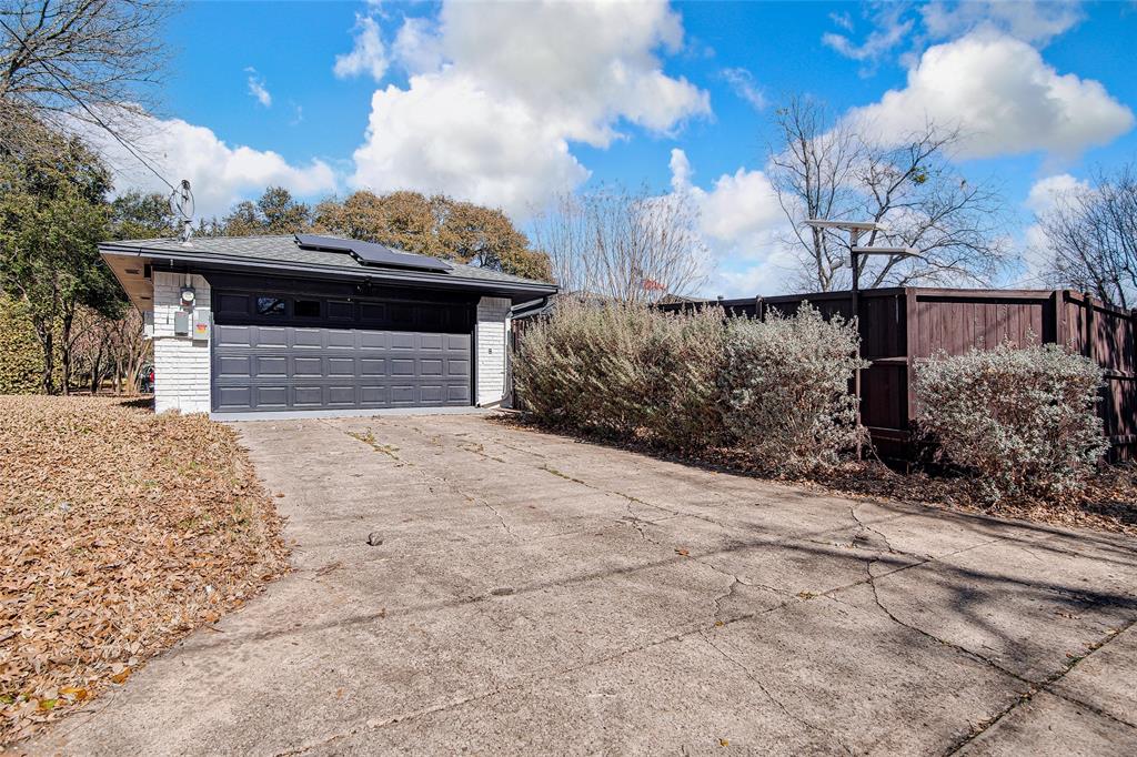 7992 Fallmeadow Lane Dallas, TX 75248 - Photo 30 of 30 a view of a backyard of the house