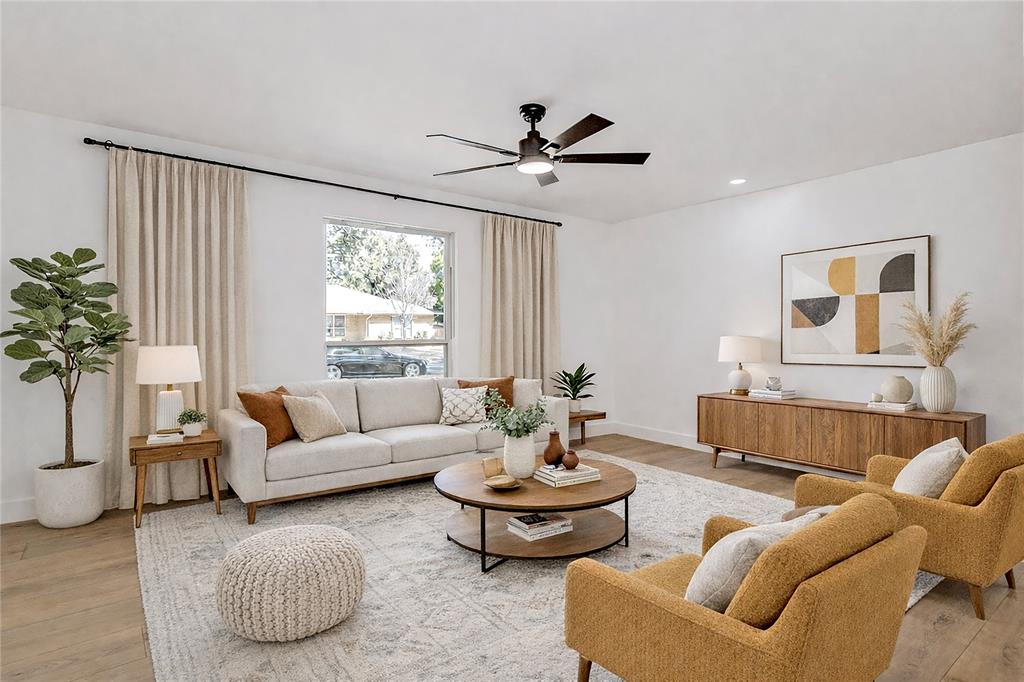 7992 Fallmeadow Lane Dallas, TX 75248 - Photo 8 of 30 a living room with furniture and a large window