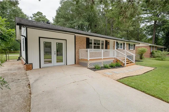 a house view with a garden space