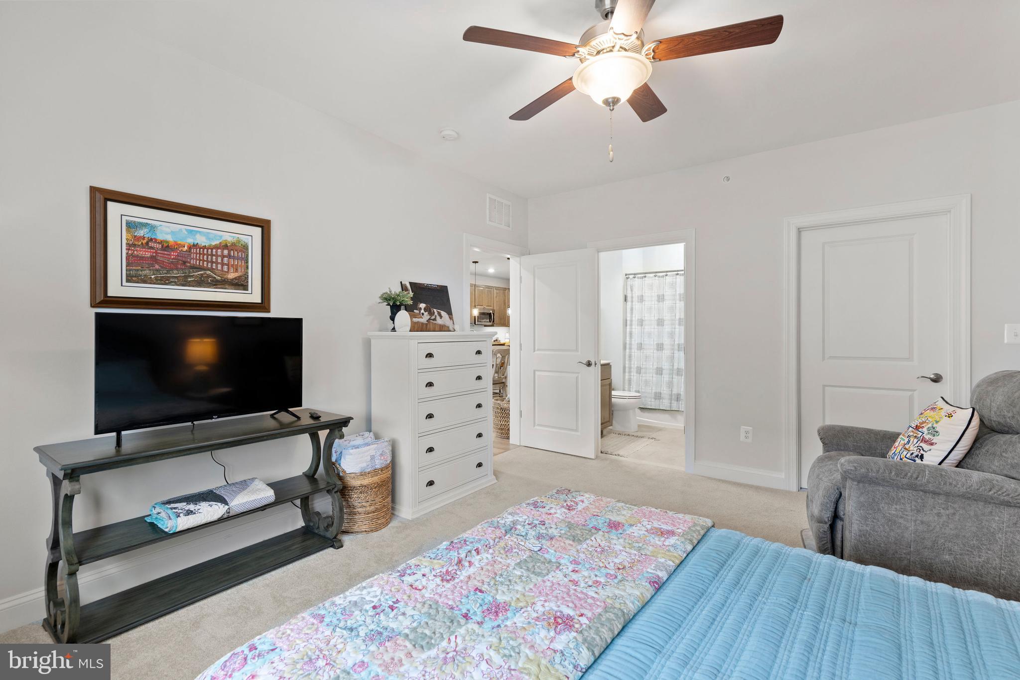 403 Bold Ruler Court, Unit 405 Havre de Grace, MD 21078 - Photo 15 of 32 a living room with furniture and a flat screen tv