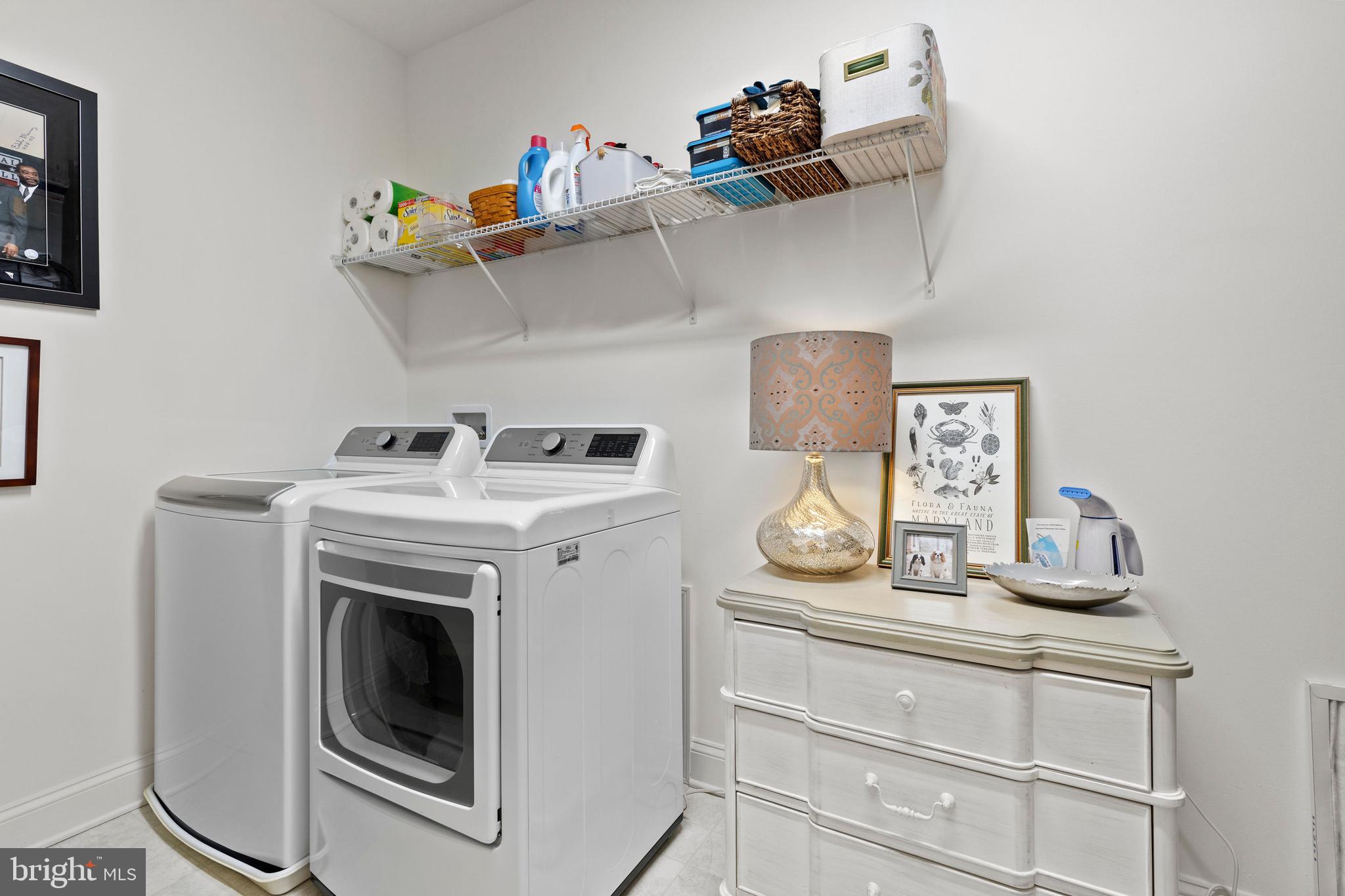 403 Bold Ruler Court, Unit 405 Havre de Grace, MD 21078 - Photo 24 of 32 a utility room with dryer and washer