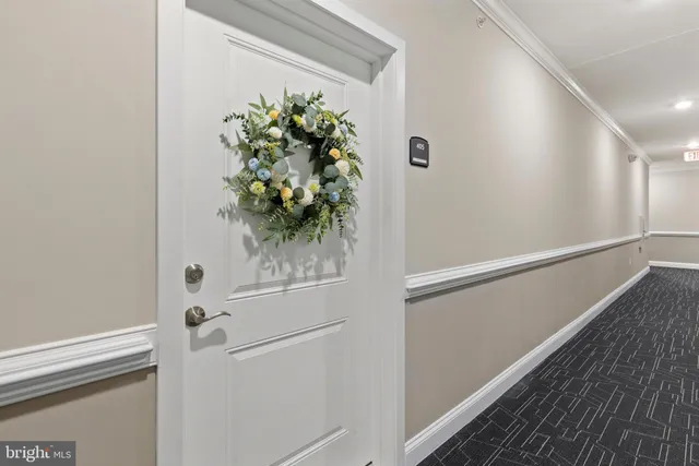 a view of a living room and entry way