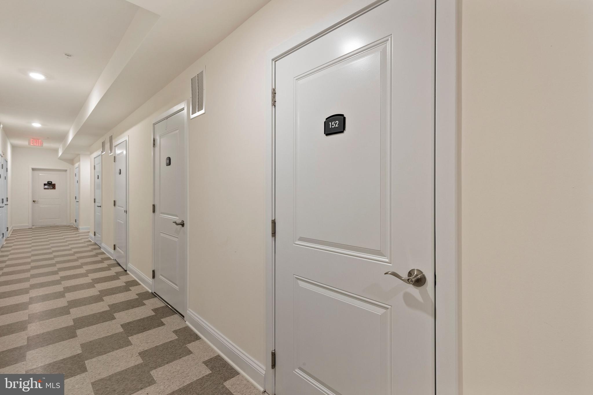 403 Bold Ruler Court, Unit 405 Havre de Grace, MD 21078 - Photo 27 of 32 a view of a bathroom from a hallway