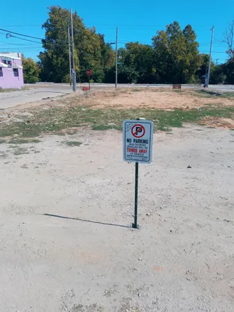 a view of a street with trees