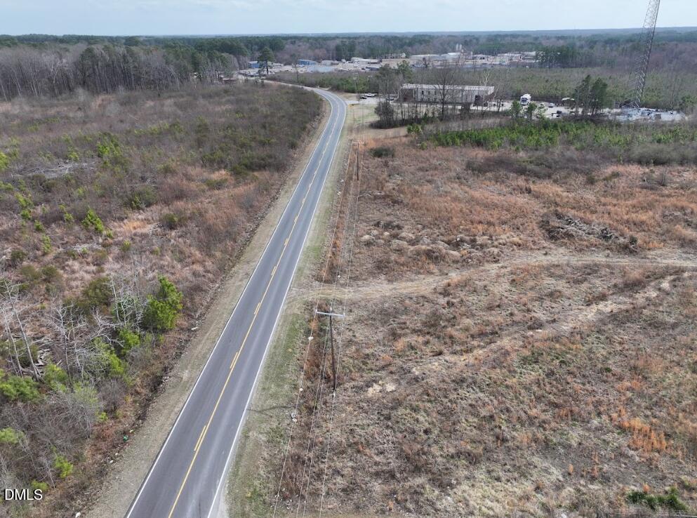 0 Instrument Drive Rocky Mount, NC 27804 - Photo 6 of 20 a view of a dry yard with wooden fence