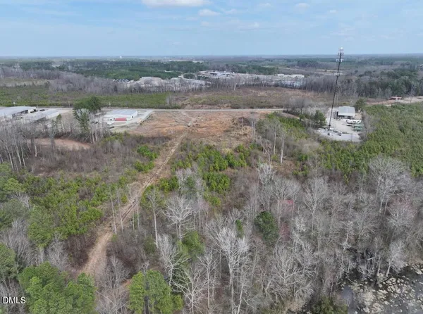 an aerial view of residential house with outdoor space