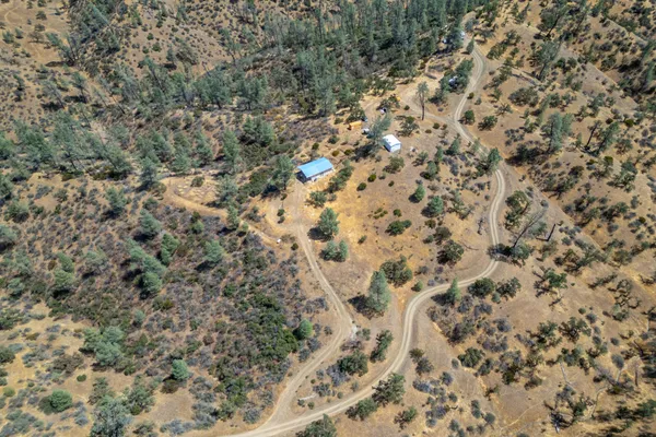 an aerial view of residential house with outdoor space