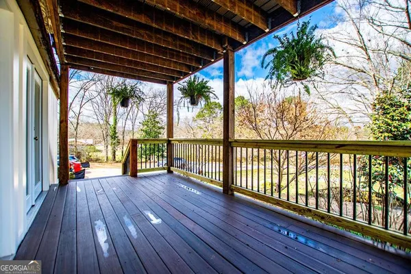 a view of a swimming pool with a lounge chairs