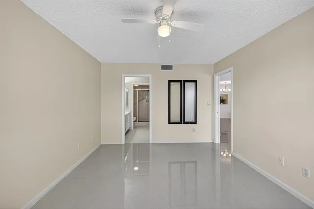 a view of swimming pool from a window