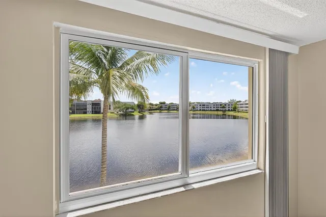 a bathroom with a double vanity sink toilet and shower