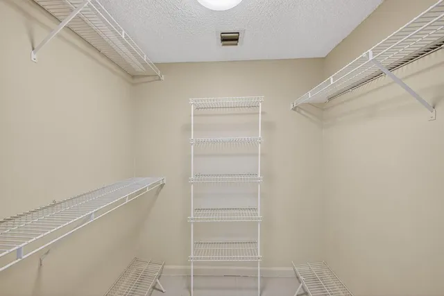 wooden floor and window in an empty room