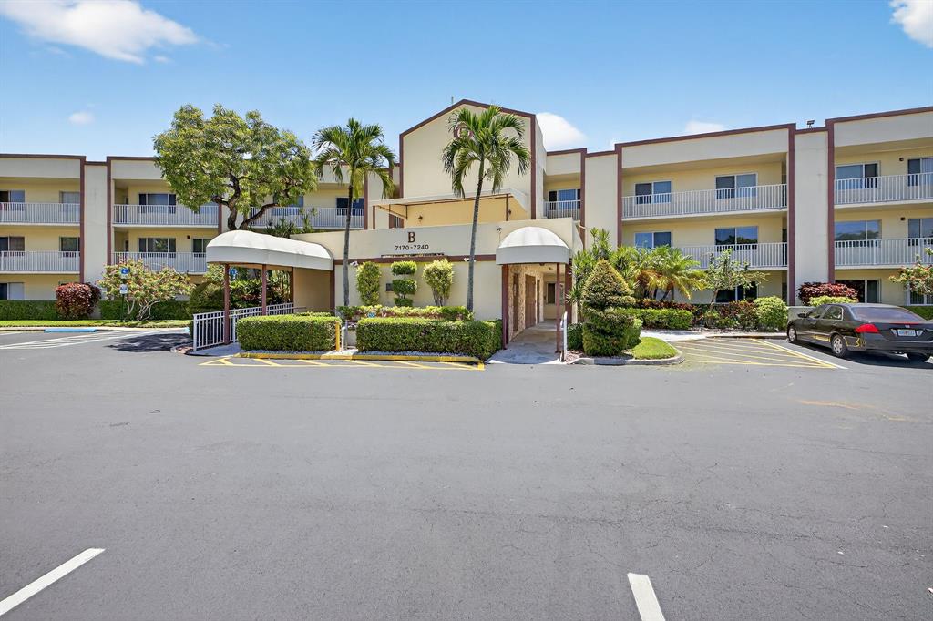 7214 South Devon Drive, Unit 7214 Tamarac, FL 33321 - Photo 24 of 24 a view of multiple houses with a street