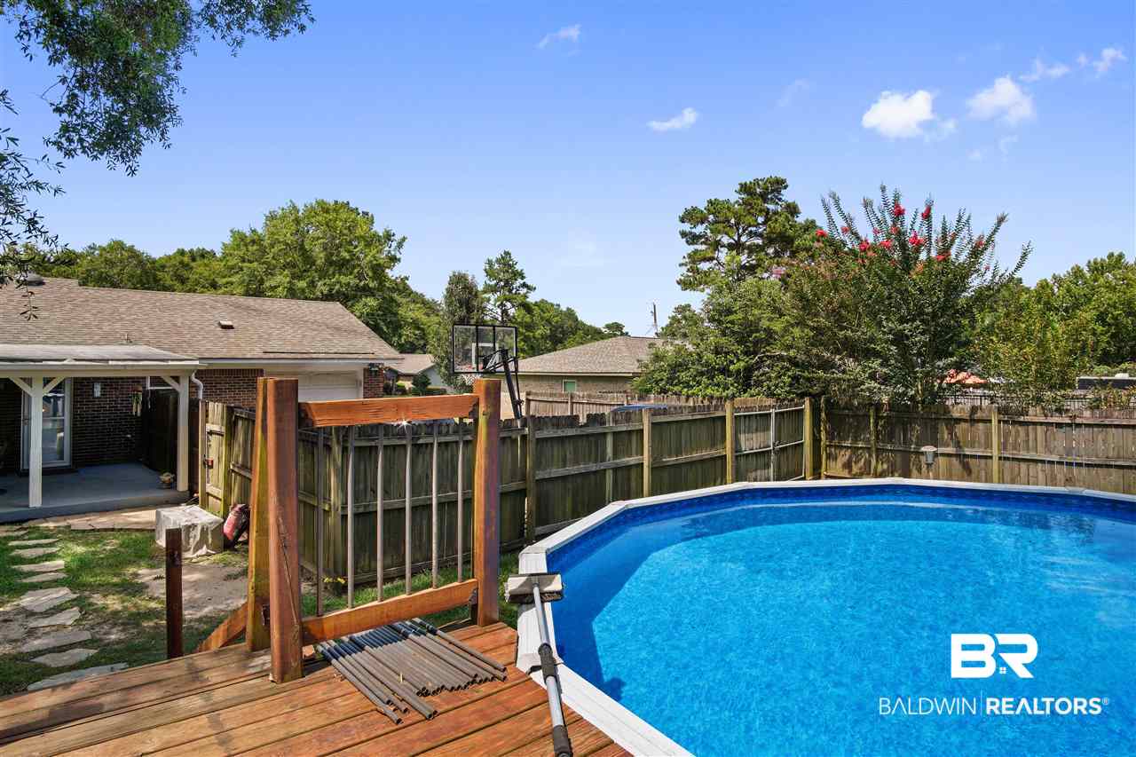 6681 David Drive South Theodore, AL 36582 - Photo 31 of 31 Pool with Deck